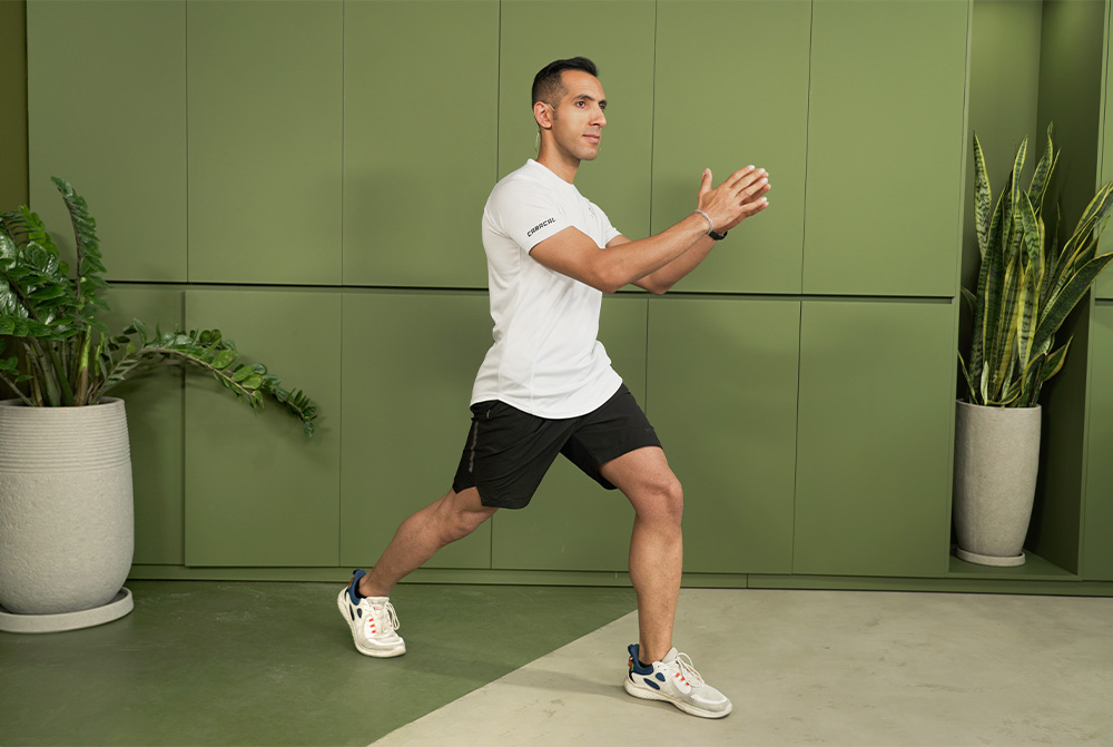 aerobic coach practicing with a white shirt in a modern location